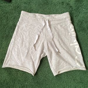 Light grey/white Calvin Klein Performance shorts. Size small